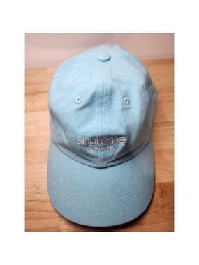 SUPREME CAP
